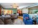 Open living room with views into dining area and entryway at 9338 Clearmeadow Ln, New Port Richey, FL 34655
