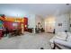 Open living room and dining area with a neutral color palette at 9338 Clearmeadow Ln, New Port Richey, FL 34655
