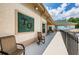 Community patio with chairs and pool view at 9338 Clearmeadow Ln, New Port Richey, FL 34655