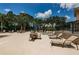 Enjoy the sun on the lounge chairs around the pool at 9338 Clearmeadow Ln, New Port Richey, FL 34655