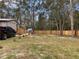 Backyard with wooden fence and patio set at 11743 Purdue St, New Port Richey, FL 34654