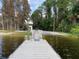 Lake boat ramp with dock and access to the water at 11743 Purdue St, New Port Richey, FL 34654