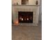 Cozy fireplace with lit candles and a salt lamp at 11743 Purdue St, New Port Richey, FL 34654
