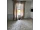 Living room with beige curtains and carpet at 11743 Purdue St, New Port Richey, FL 34654
