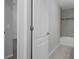 Bathroom with tub and dark brown vanity at 12040 Pine Warbler Ave, Brooksville, FL 34614