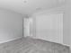 Spacious bedroom with double door closet and carpet flooring at 12040 Pine Warbler Ave, Brooksville, FL 34614