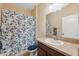 Clean bathroom with shower/tub combo and updated vanity at 12307 Duckett Ct, Spring Hill, FL 34610
