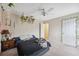 Charming bedroom with unique decor and ceiling fan at 12307 Duckett Ct, Spring Hill, FL 34610