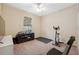 Bedroom with TV, exercise bike, and ample closet space at 12307 Duckett Ct, Spring Hill, FL 34610