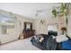 Bedroom with window, dresser, and full-size bed at 12307 Duckett Ct, Spring Hill, FL 34610