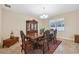 Formal dining room with ornate furniture and chandelier at 12307 Duckett Ct, Spring Hill, FL 34610