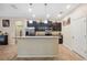Modern kitchen with stainless steel appliances and granite countertops at 12307 Duckett Ct, Spring Hill, FL 34610