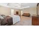 Main bedroom with a king-size bed and plenty of natural light at 12307 Duckett Ct, Spring Hill, FL 34610