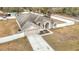 Single story house with fenced yard and driveway at 12312 Millington Ave, Weeki Wachee, FL 34614