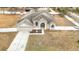 One-story house with a large yard and driveway at 12312 Millington Ave, Weeki Wachee, FL 34614