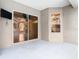Covered patio with sliding glass doors leading to the pool area at 12312 Millington Ave, Weeki Wachee, FL 34614