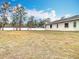 Fenced backyard offering privacy and potential for landscaping at 12312 Millington Ave, Weeki Wachee, FL 34614