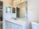 Clean bathroom with vanity, mirror and toilet at 12312 Millington Ave, Weeki Wachee, FL 34614
