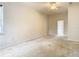 Bright bedroom with pool view and ceiling fan at 12312 Millington Ave, Weeki Wachee, FL 34614