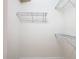Spacious closet with wire shelving and hanging rods at 12312 Millington Ave, Weeki Wachee, FL 34614