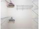 Closet with wire shelving and hanging rods at 12312 Millington Ave, Weeki Wachee, FL 34614