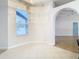 Dining area with tile floors and view to backyard at 12312 Millington Ave, Weeki Wachee, FL 34614