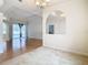 Bright dining area with carpet and views of living room and pool at 12312 Millington Ave, Weeki Wachee, FL 34614
