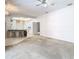 Open kitchen with breakfast bar and view of living room at 12312 Millington Ave, Weeki Wachee, FL 34614