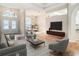 Living room with stylish furniture and hardwood floors at 12312 Millington Ave, Weeki Wachee, FL 34614