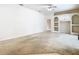 Living room with ceiling fan and built in shelving at 12312 Millington Ave, Weeki Wachee, FL 34614