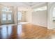 Open living space with hardwood floors and entryway views at 12312 Millington Ave, Weeki Wachee, FL 34614