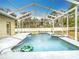 Relaxing screened pool and spa with plenty of room for fun at 12312 Millington Ave, Weeki Wachee, FL 34614