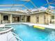 Large screened pool with spa and plenty of room to relax at 12312 Millington Ave, Weeki Wachee, FL 34614