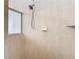 Large walk in shower with window and built in shelf at 12312 Millington Ave, Weeki Wachee, FL 34614