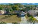 Aerial view of a single story house in a residential area at 1318 Altoona Ave, Spring Hill, FL 34609