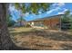 Large backyard with screened porch and grill at 1318 Altoona Ave, Spring Hill, FL 34609