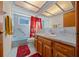 Charming bathroom with a Mickey Mouse curtain at 1318 Altoona Ave, Spring Hill, FL 34609