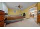 Bedroom with carpeted floor and view of kitchen at 1318 Altoona Ave, Spring Hill, FL 34609