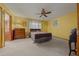 Bright bedroom with carpeted floor, double bed, and dresser at 1318 Altoona Ave, Spring Hill, FL 34609