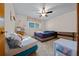 Cozy bedroom with twin and full-size beds at 1318 Altoona Ave, Spring Hill, FL 34609