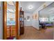 Bright entryway with tile flooring, access to living room and bathroom at 1318 Altoona Ave, Spring Hill, FL 34609