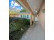 Inviting front entry with covered walkway, leading to the front door at 1318 Altoona Ave, Spring Hill, FL 34609