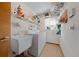 Laundry room with washer, dryer and shelving at 1318 Altoona Ave, Spring Hill, FL 34609