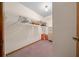 Spacious walk-in closet with ample shelving and hanging rods at 1318 Altoona Ave, Spring Hill, FL 34609