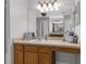 Double vanity bathroom with a large mirror and plenty of counter space at 13468 Haverhill Dr, Spring Hill, FL 34609