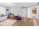 Bright playroom with access to bathroom and other rooms at 13468 Haverhill Dr, Spring Hill, FL 34609