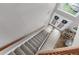 View from the top of the stairs, showing the entryway below at 13468 Haverhill Dr, Spring Hill, FL 34609