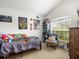Fun bedroom with a single bed, plenty of toys, and themed decor at 14284 Finsbury Dr, Spring Hill, FL 34609
