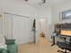 Bright bedroom with a workspace and built-in closet at 14284 Finsbury Dr, Spring Hill, FL 34609