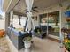 Relaxing covered patio with seating area, perfect for outdoor entertaining at 14284 Finsbury Dr, Spring Hill, FL 34609